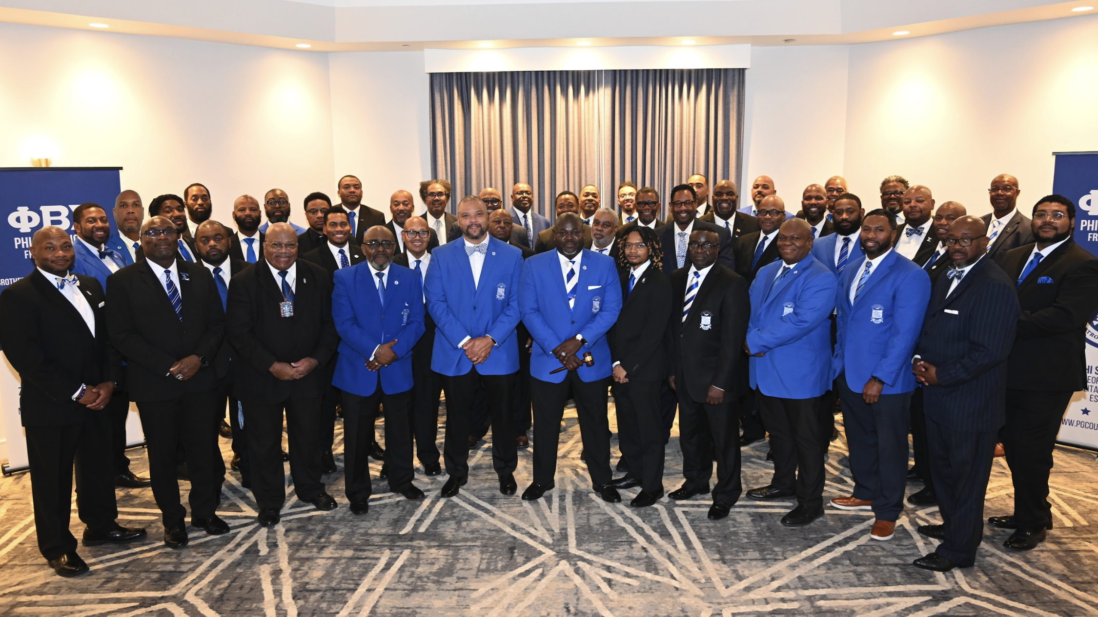 The brothers of Zeta Chi Sigma gathered in blue and white